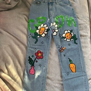 Cider Blue Jeans with Colorful Floral Graphics